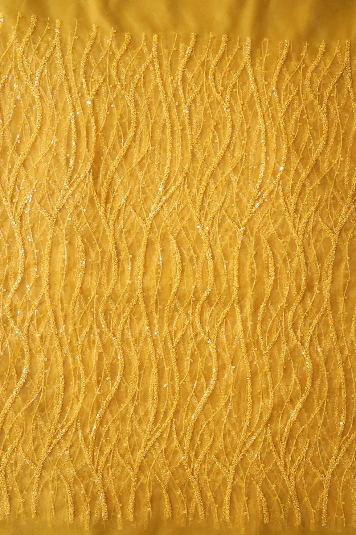 Beautiful Sequins With Yellow Thread Wavy Embroidery Work On Yellow Soft Net Fabric