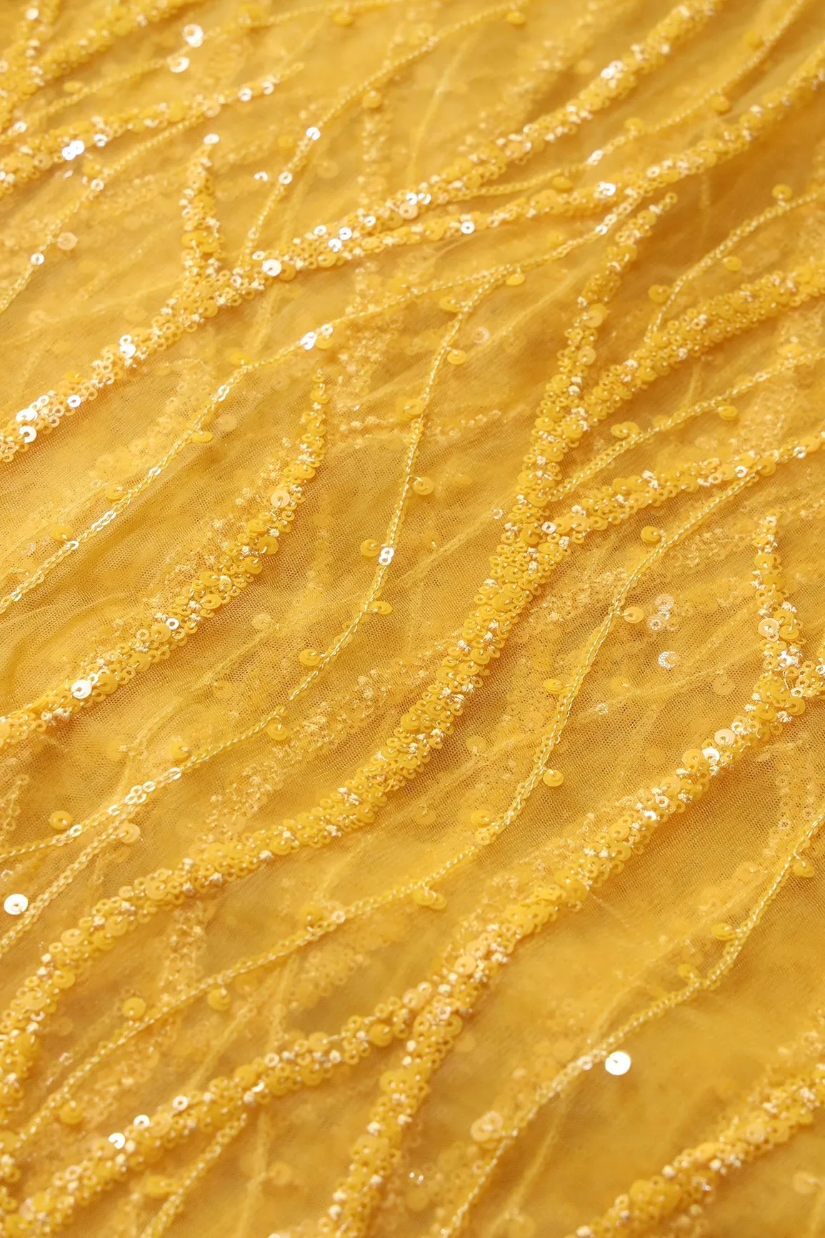 Beautiful Sequins With Yellow Thread Wavy Embroidery Work On Yellow Soft Net Fabric