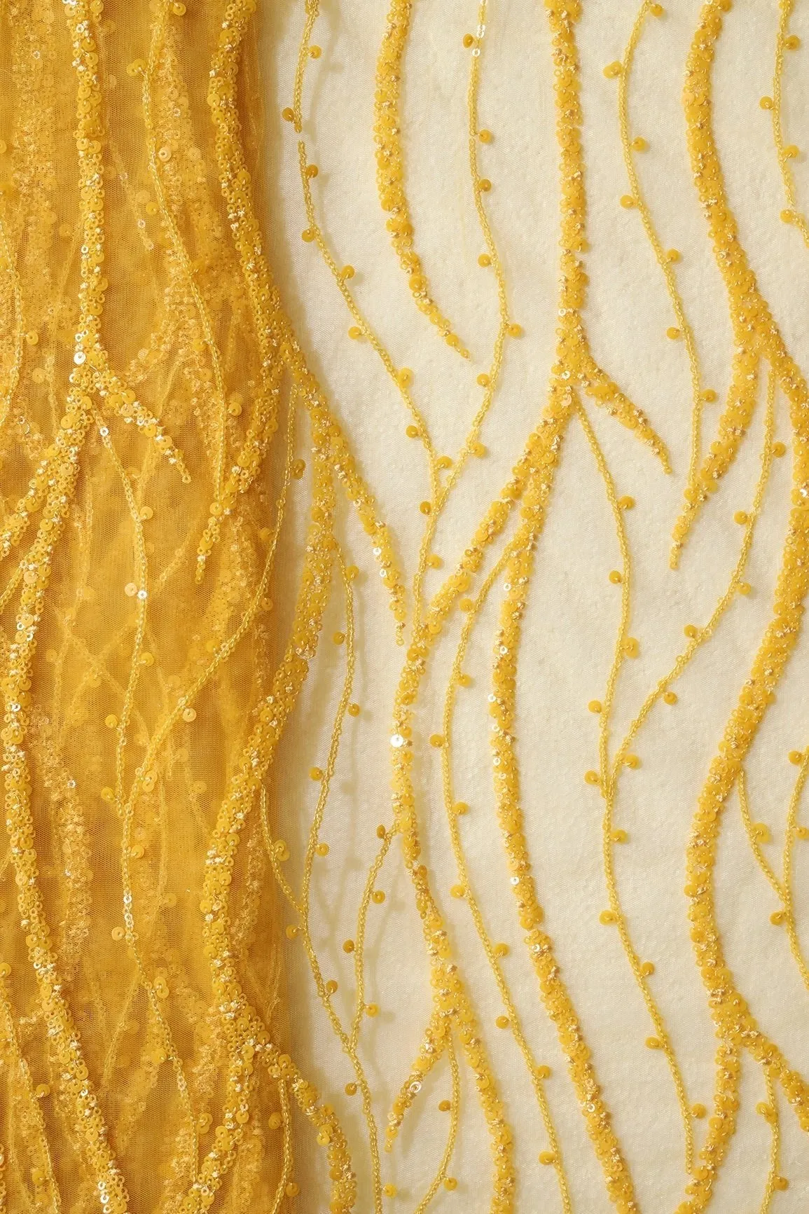 Beautiful Sequins With Yellow Thread Wavy Embroidery Work On Yellow Soft Net Fabric